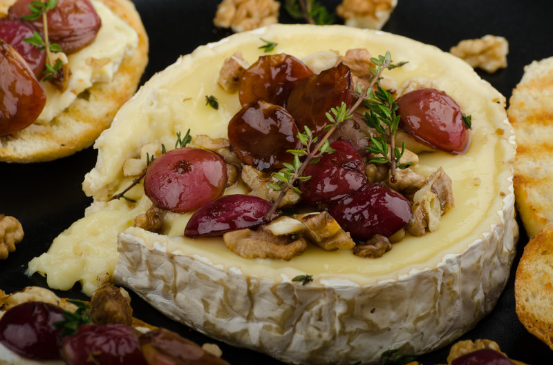 Baked Brie With Nuts, Herbs and Grapes